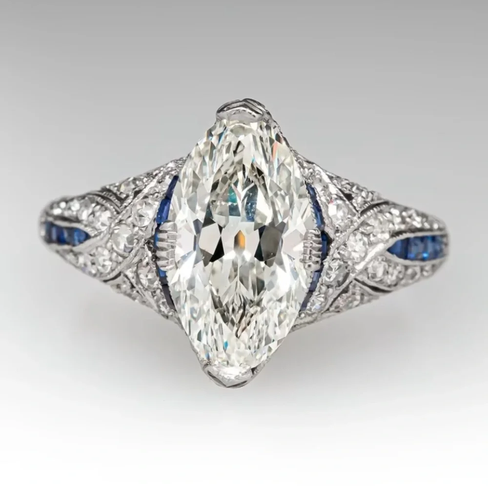 9.25 Sterling Silver Marquise Moissanite Ring with Blue Sapphire Accents - Picture 1 of 4
